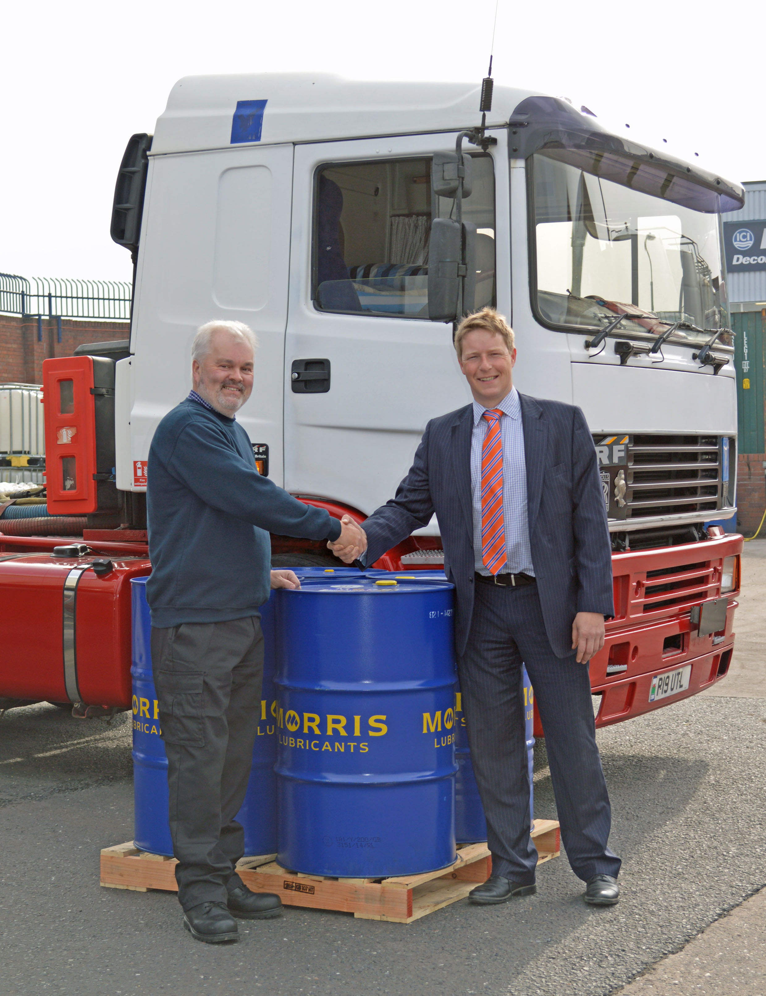 George Starkey (left) thanks Morris Lubricants’ managing director Andrew Goddard for supplying the quality oil that has helped his reliable ERF tractor unit clock 1.7 million miles.